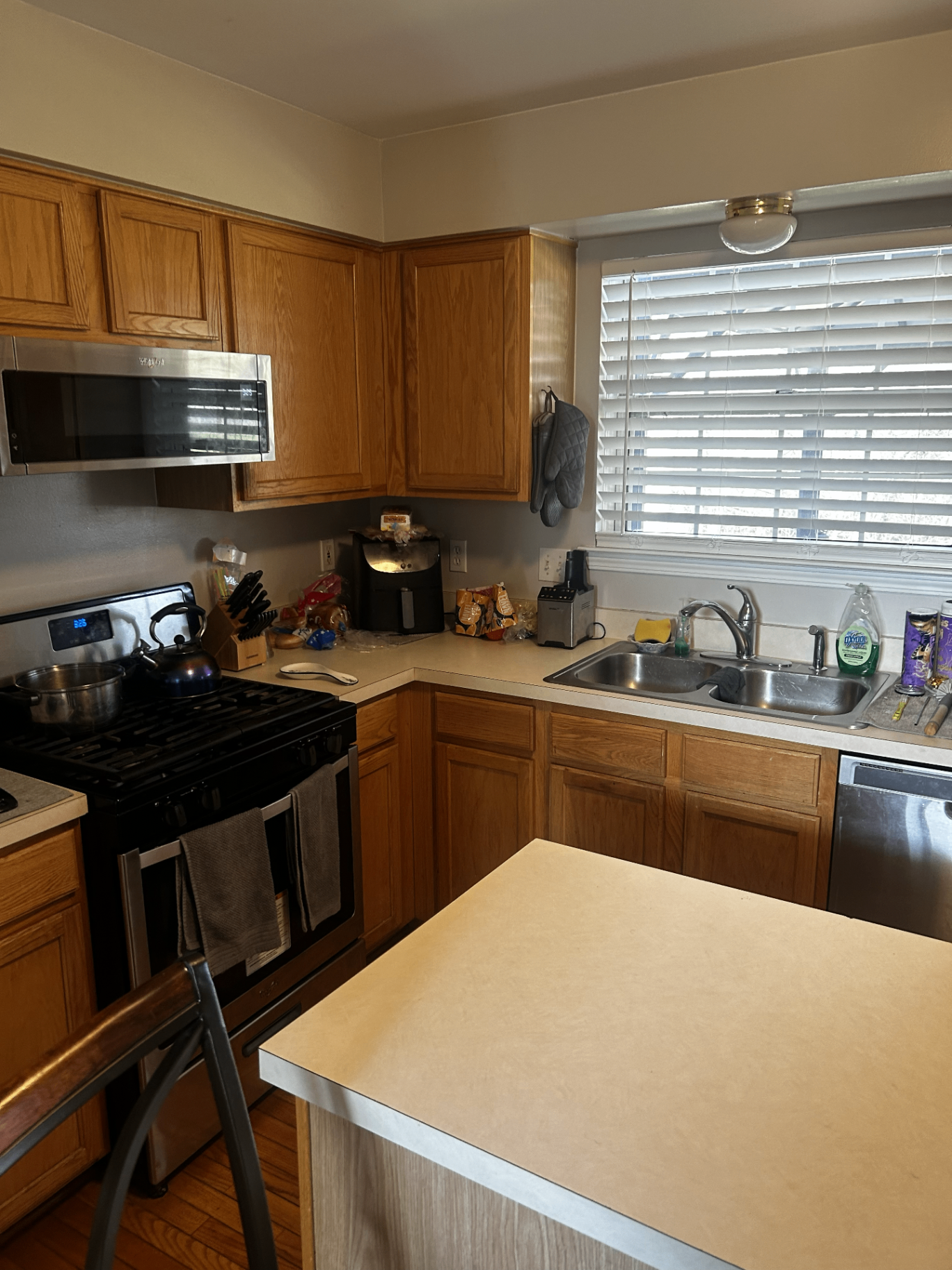 Kitchen after cleaning with polished counters and tidy finishes